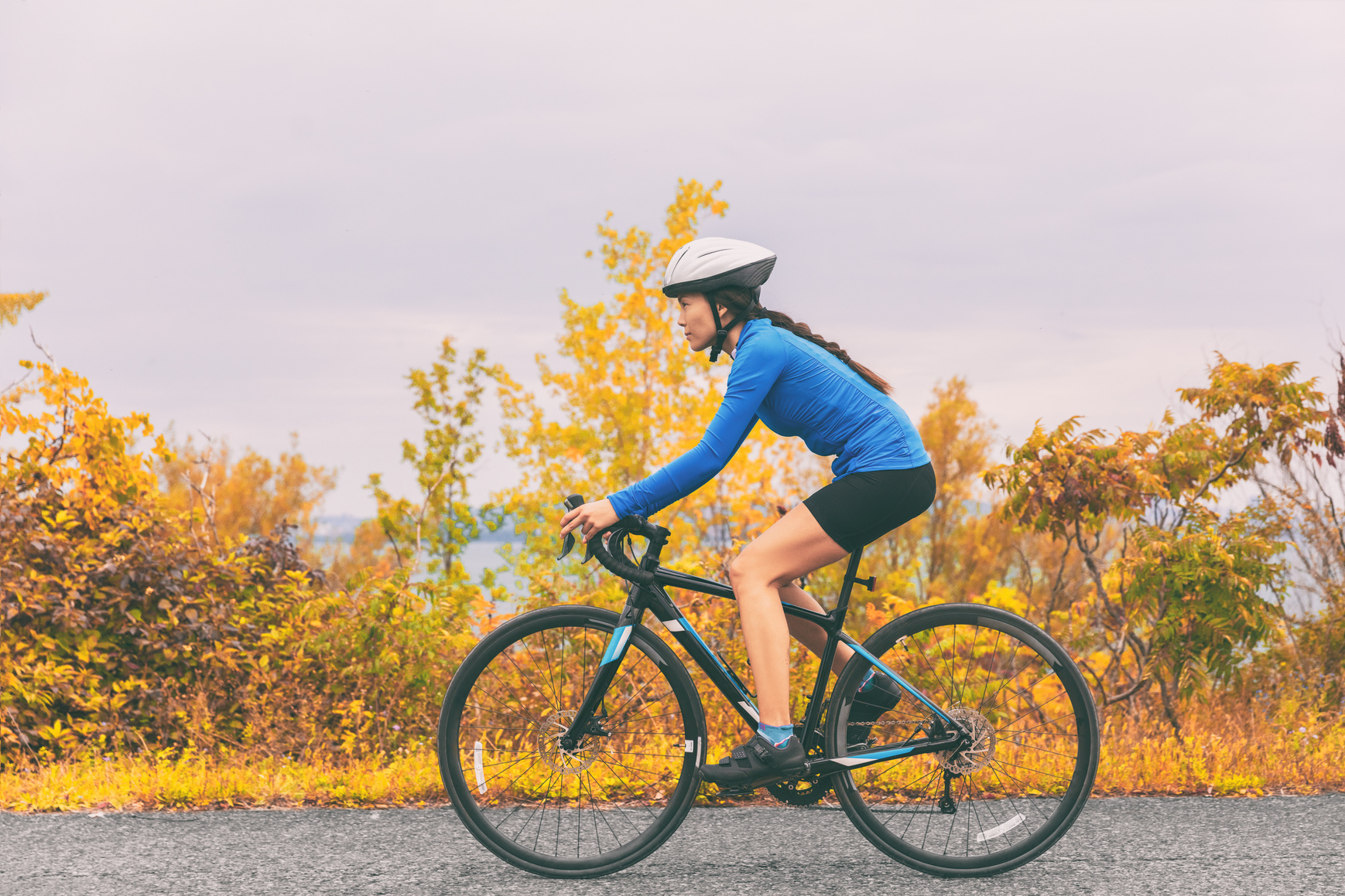 Female Cyclist Biking Outdoors